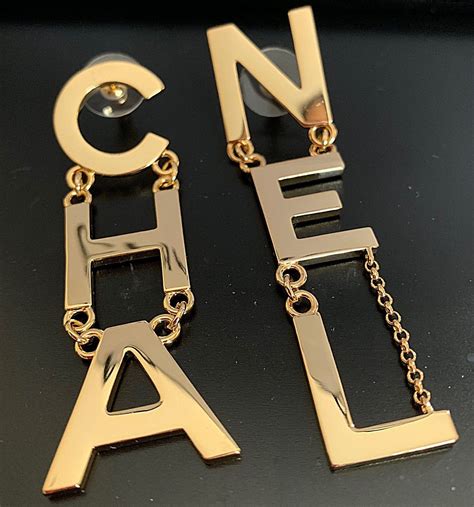 chanel long earrings gold|Chanel earrings letters price.